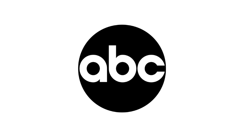 CNBC logo with colorful peacock feathers in orange, red, purple, blue, and green.