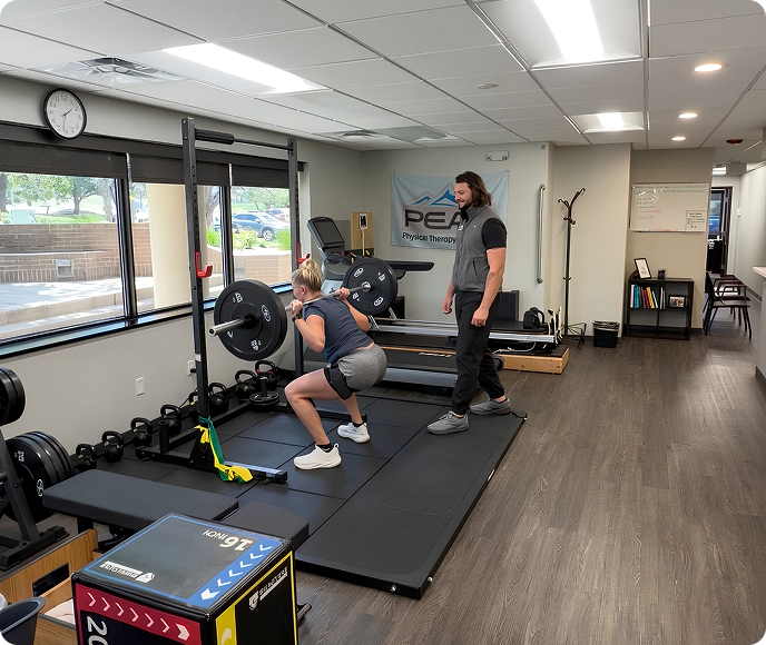 Athlete training with a Peak athletic trainer during a sports performance session