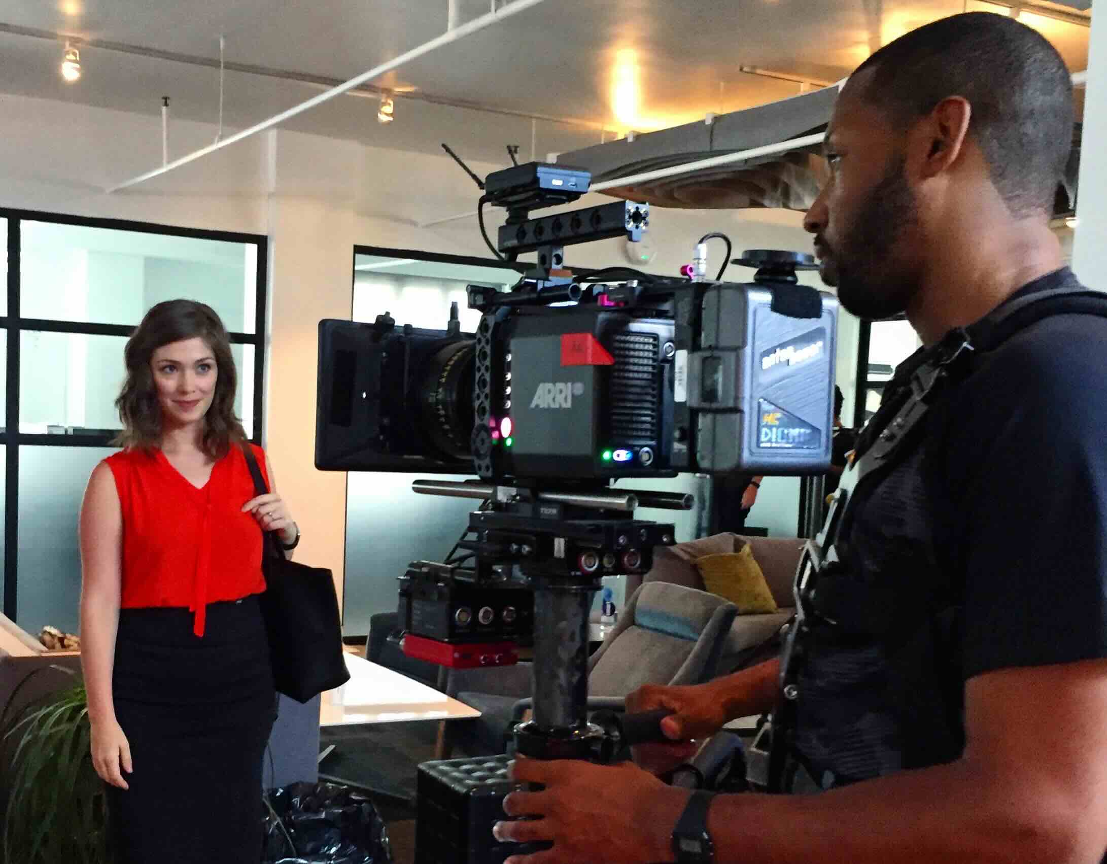 Camera operator filming a professional interview production