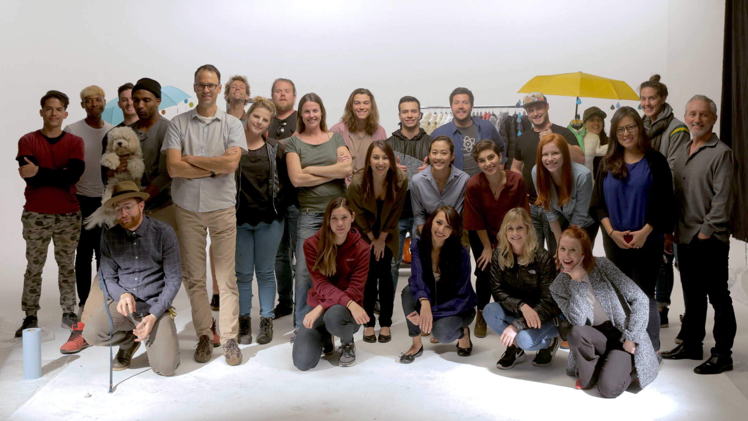 Capitola Media cast and crew gathered on a studio production set