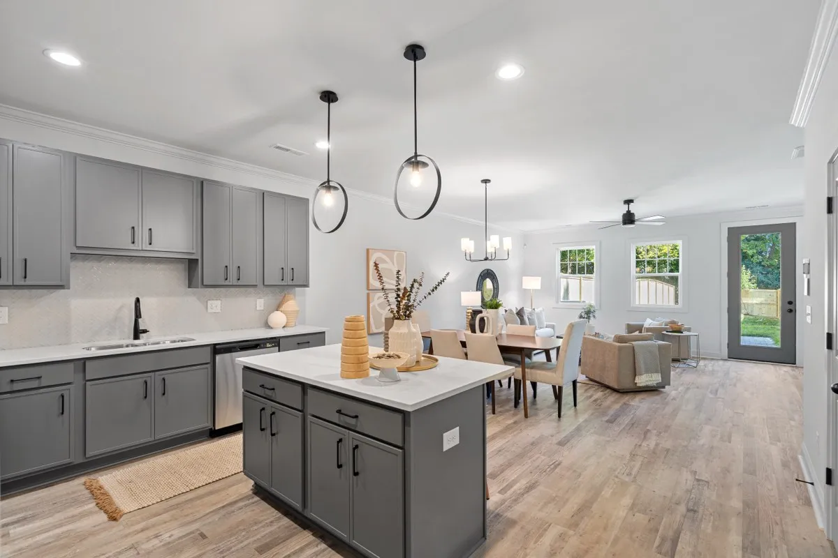 Bright open-concept kitchen and dining in a JCB Urban home