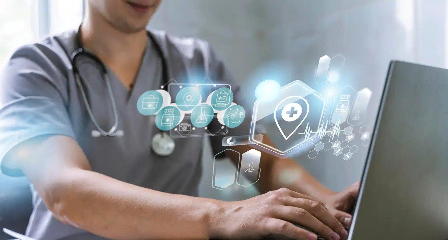 Doctor typing in a laptop
