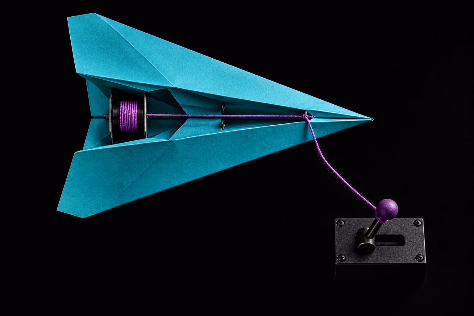 A message-shaped paper airplane conceals a control thread that operates a remote computer endpoint.