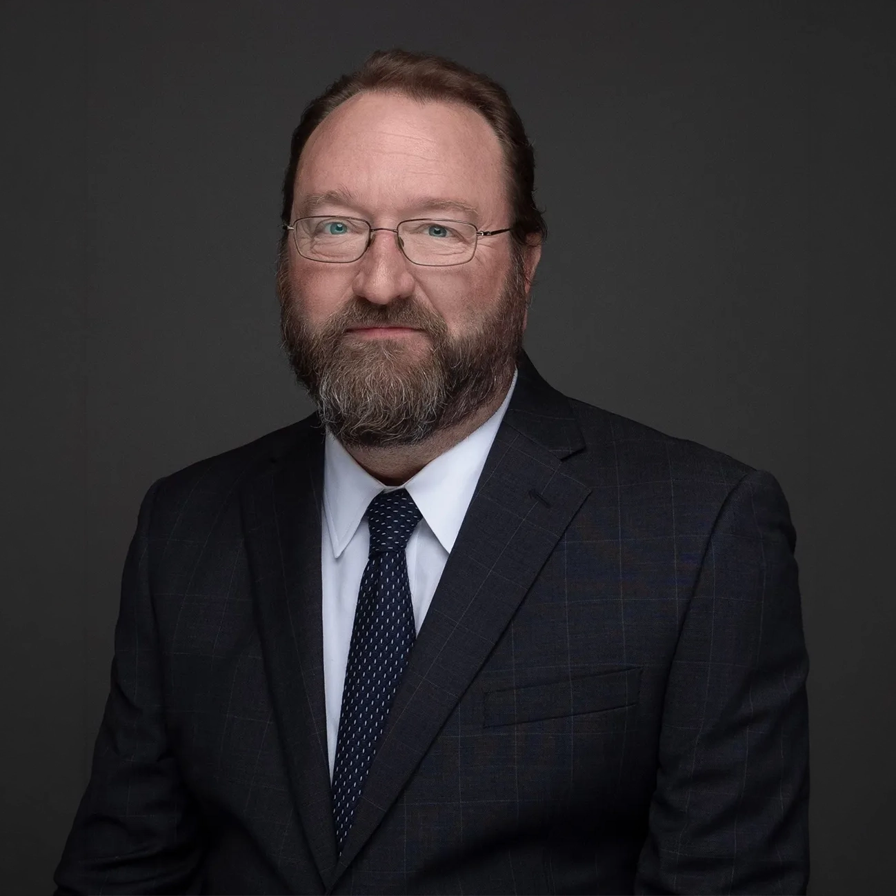 A headshot of San Antonio criminal defense attorney Jim Wheat, specializing in juvenile defense