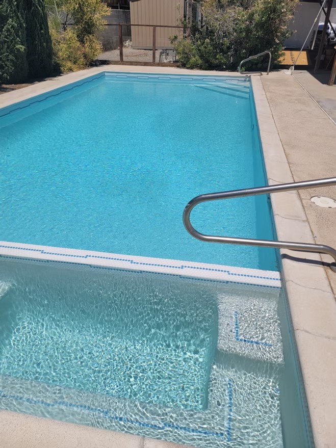 Clean rectangular pool with clear water