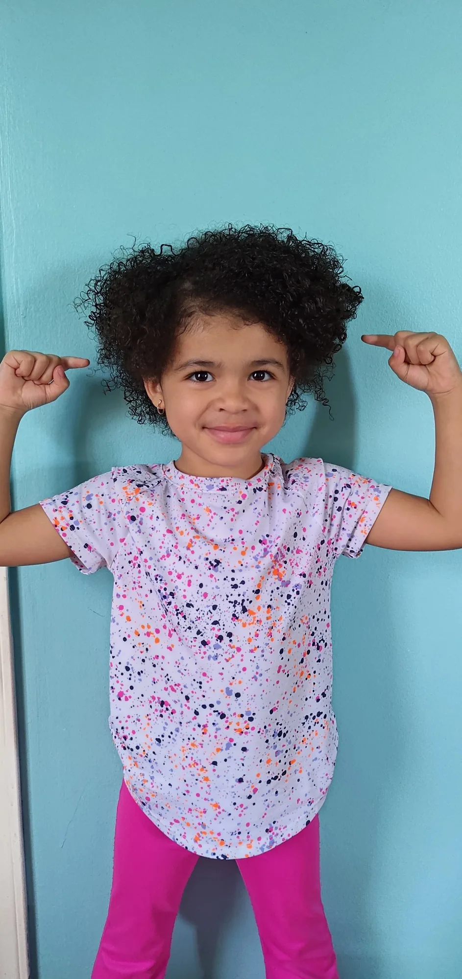 girl loving her curls