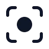 Icon of a dark circle surrounded by four corner brackets forming a focus frame.