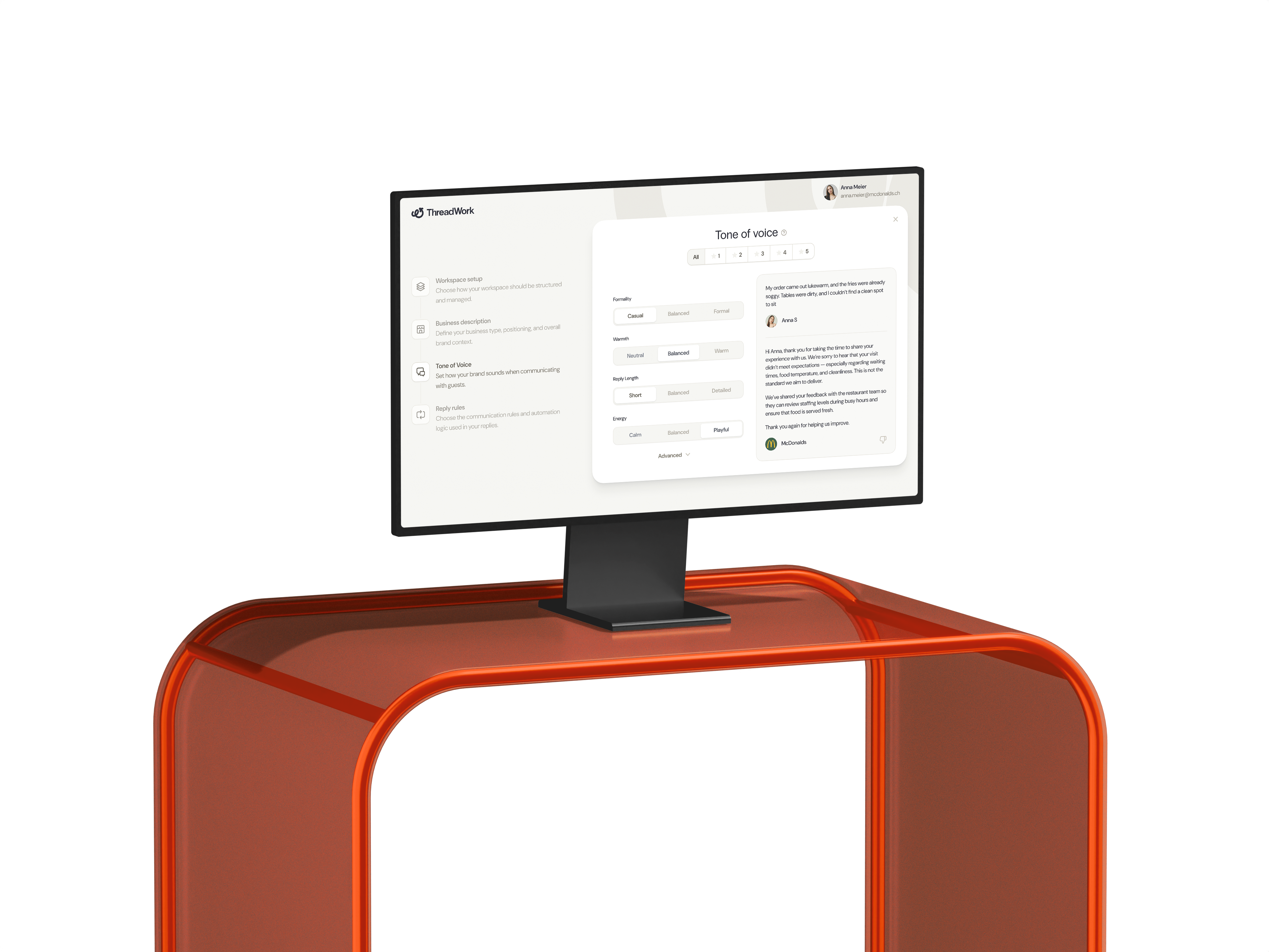 ThreadWork tone-of-voice settings and a drafted review reply on an iMac