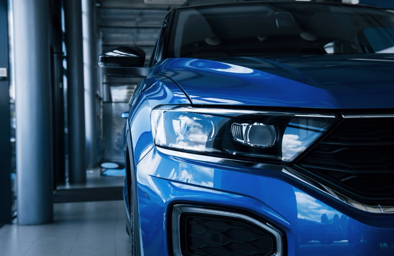 Front of a blue car ready for mobile servicing, repairs, diagnostics or a pre-purchase inspection