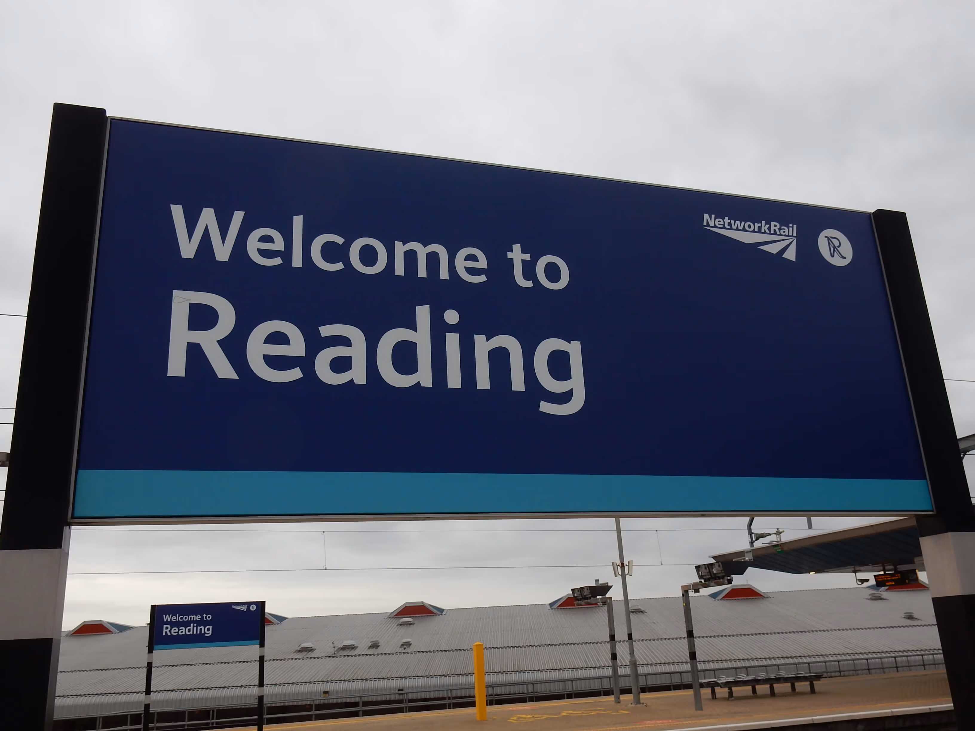 Welcome to Reading sign at Reading station, where Maxamy offers mobile car servicing and repairs