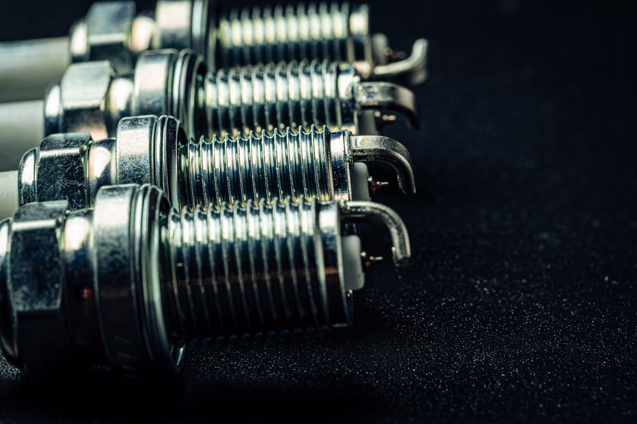 New spark plugs ready to fit during an ignition repair