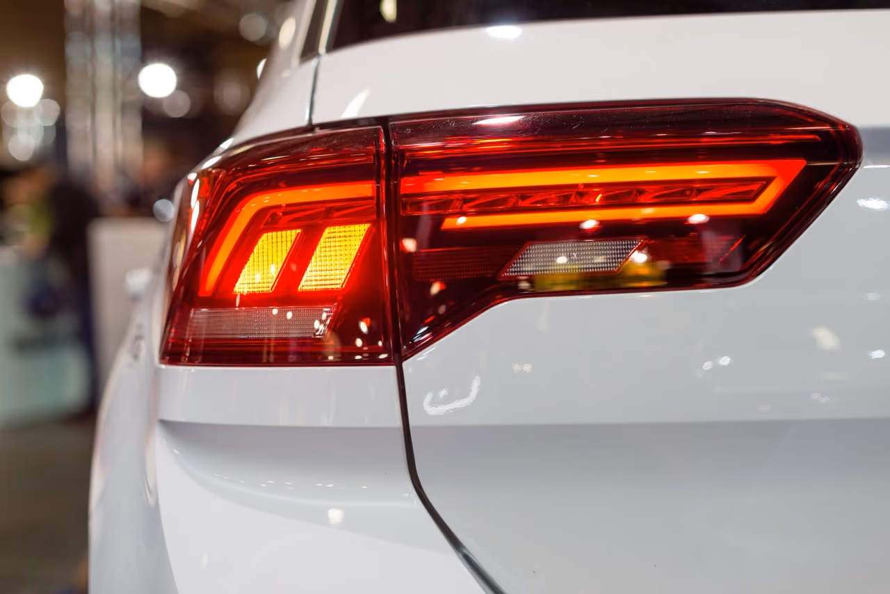 Close-up of a white car's LED rear light