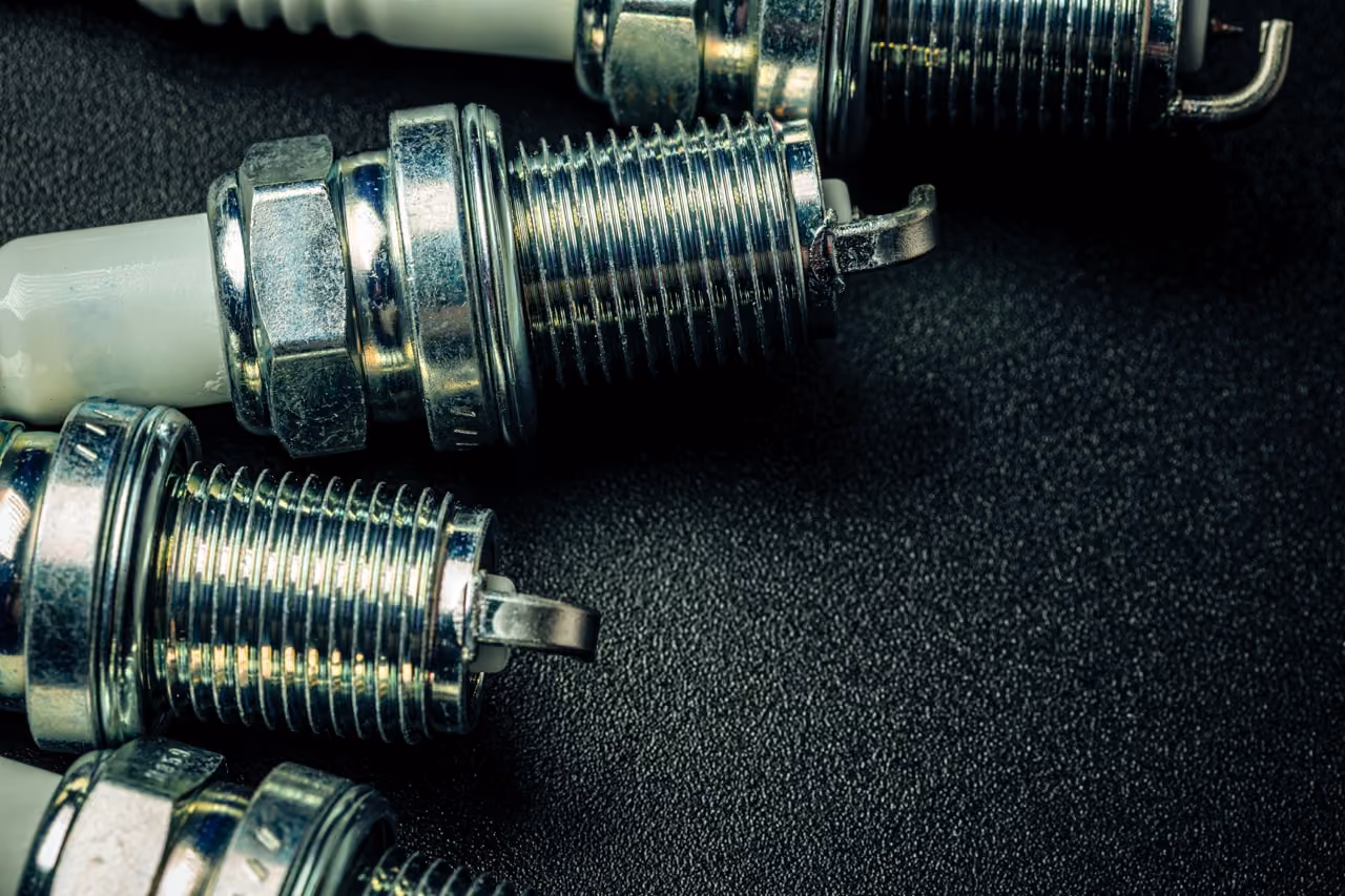 New spark plugs fitted during a mobile interim car service