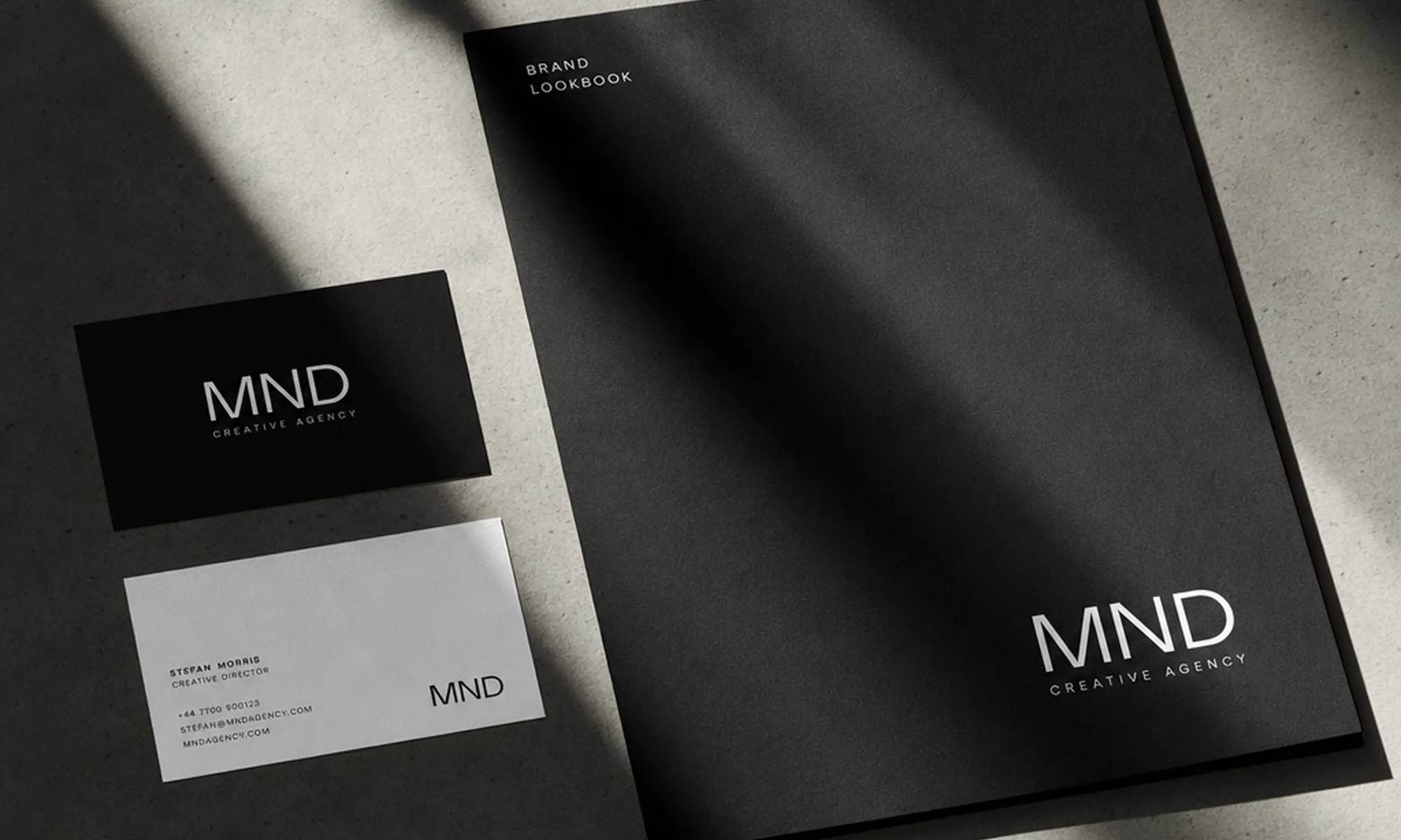MND is a modern brutalist brand identity designed for a high-end creative collective. Built entirely on Swiss typography, strict grid structures, and sharp architectural shadows.