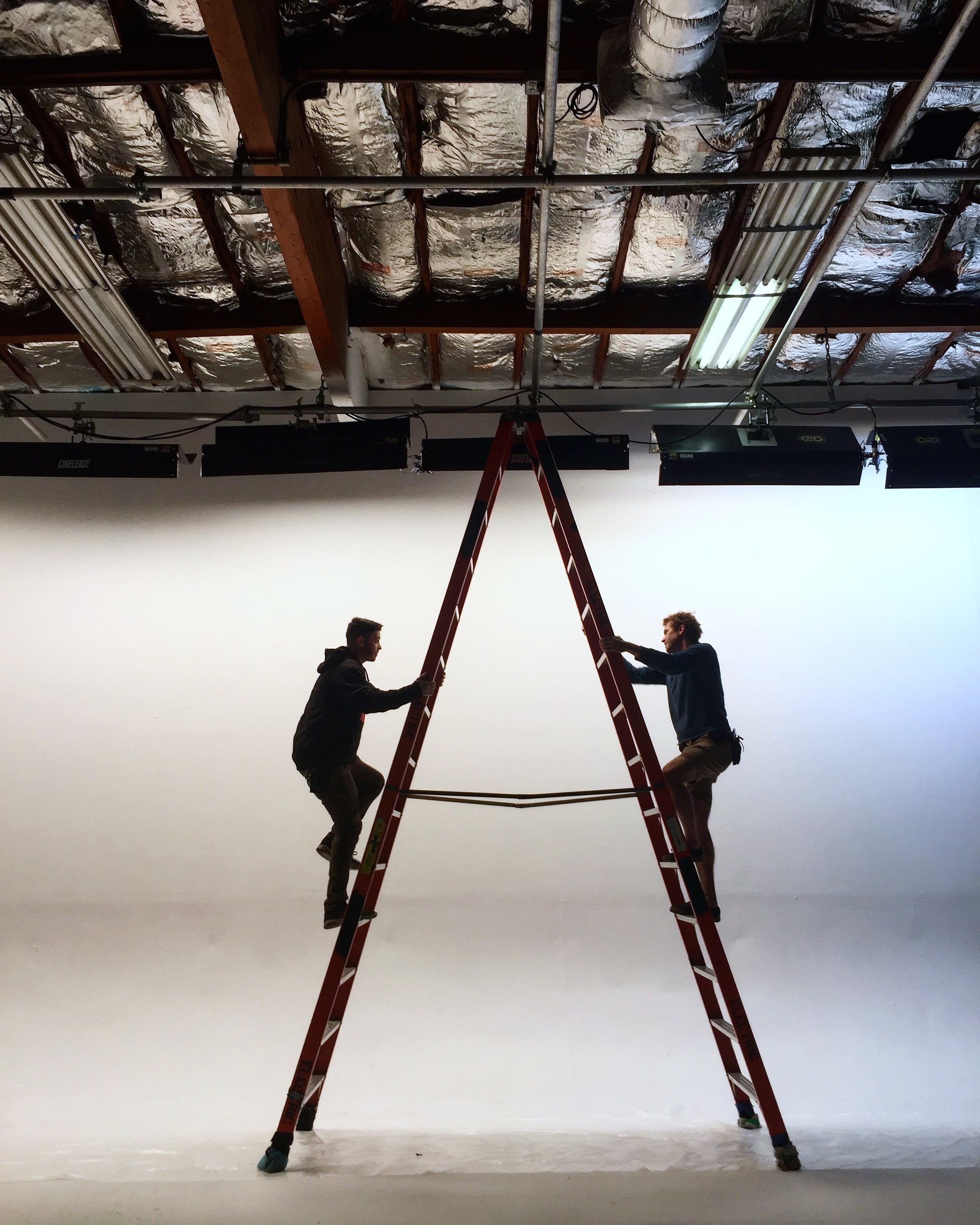 Grip and electric crew working on a professional video production set