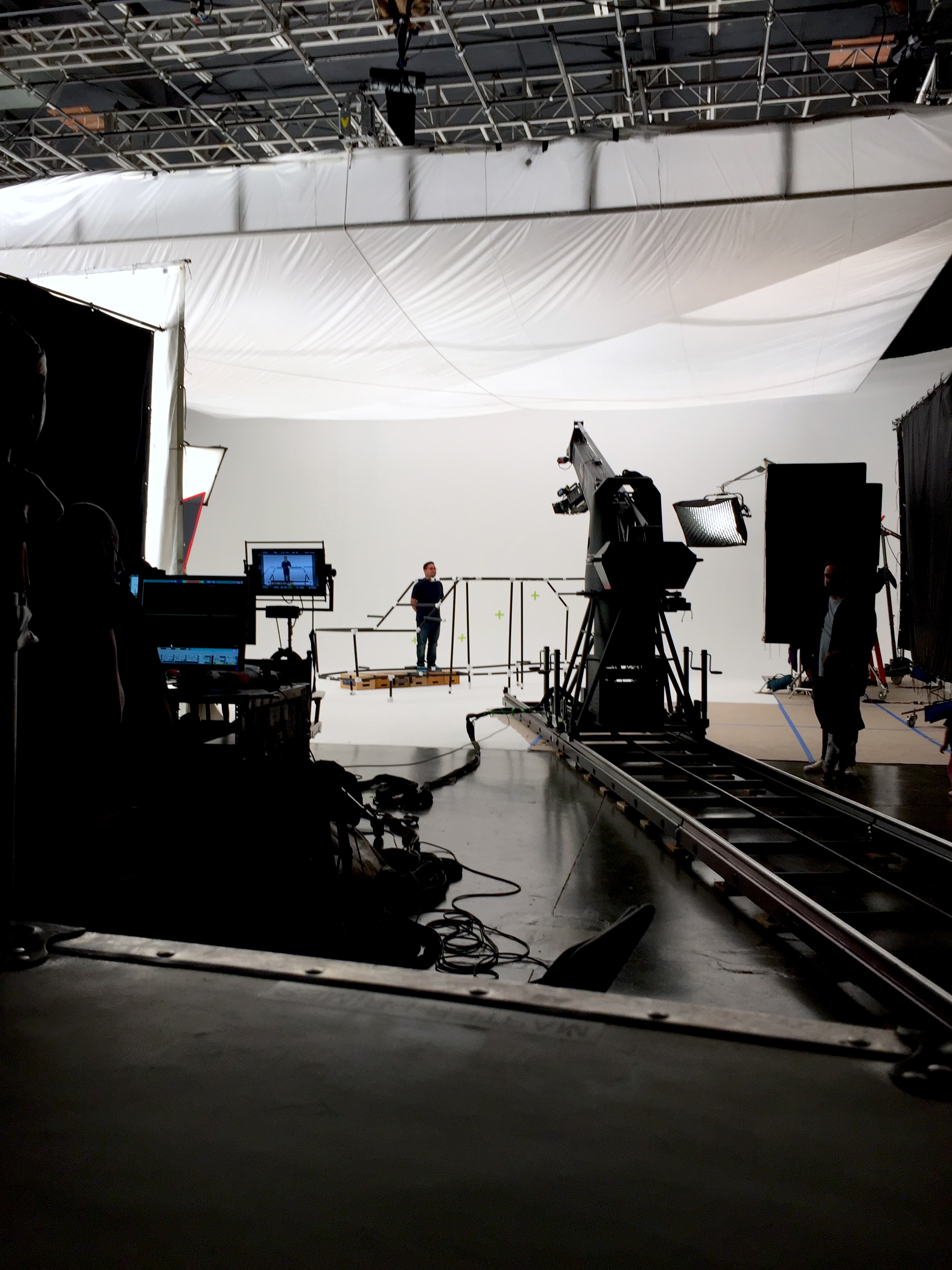 Production assistant supporting a professional video production set