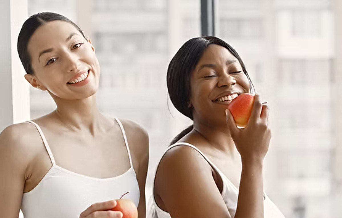Two women sharing a wellness moment
