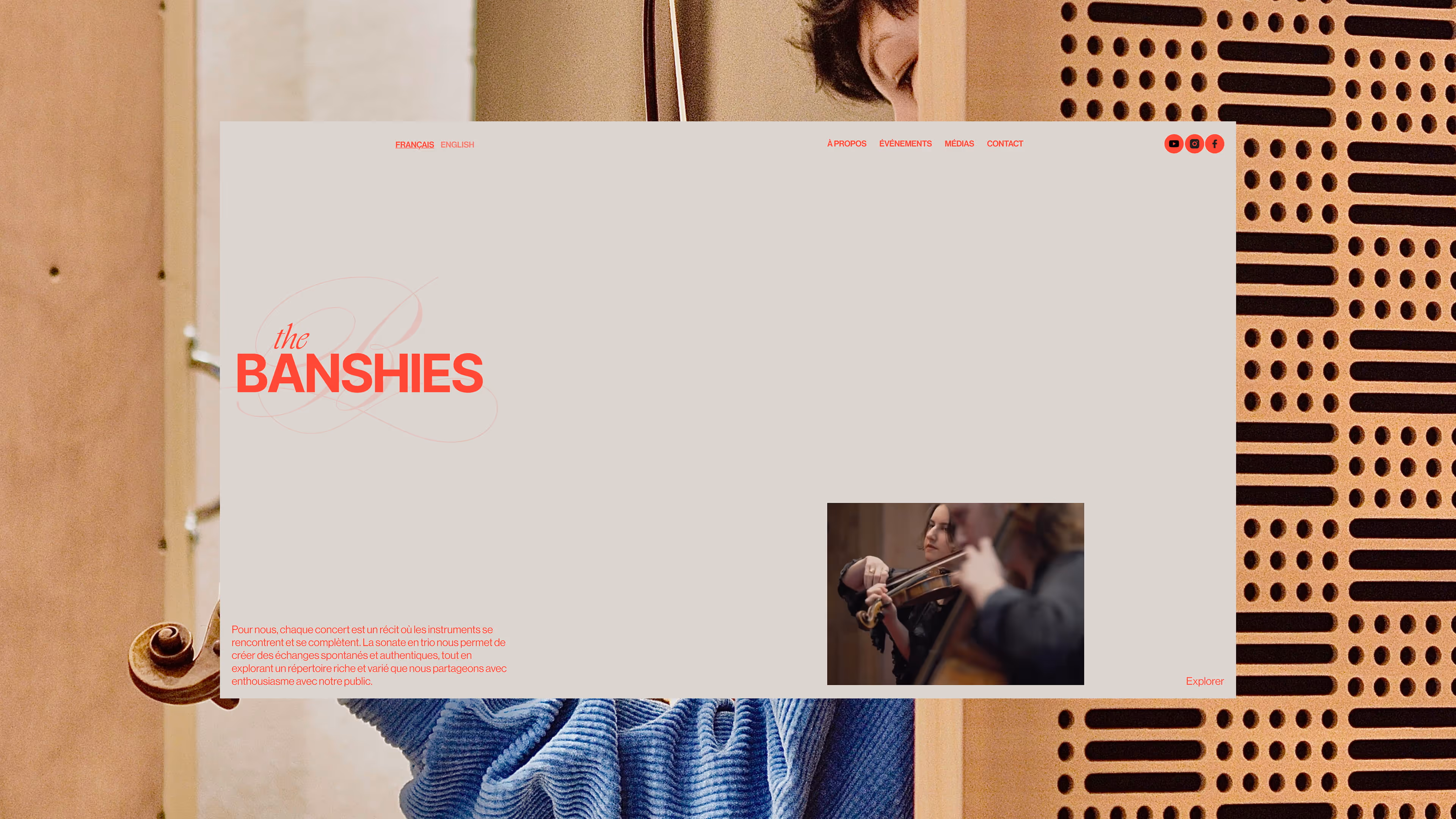 Website homepage of The Banshies with a violinist playing in a small video frame.