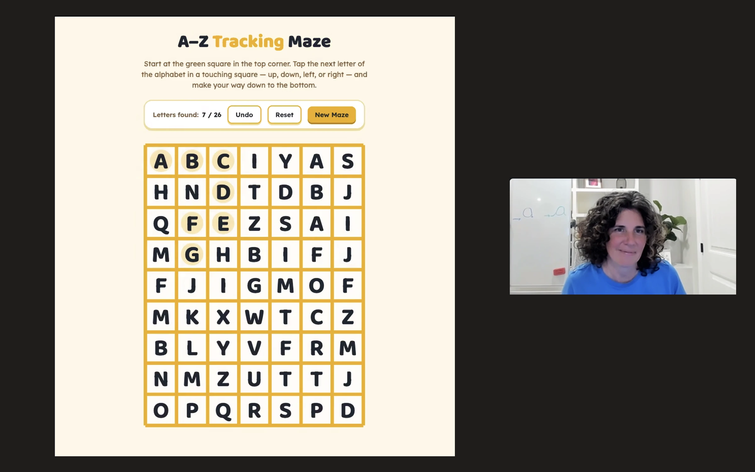 A virtual session with an A to Z letter-tracking maze on screen and Elizabeth on camera