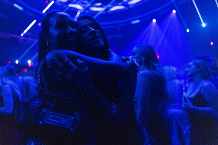 Guests in elevated nightlife outfits at a Los Angeles club