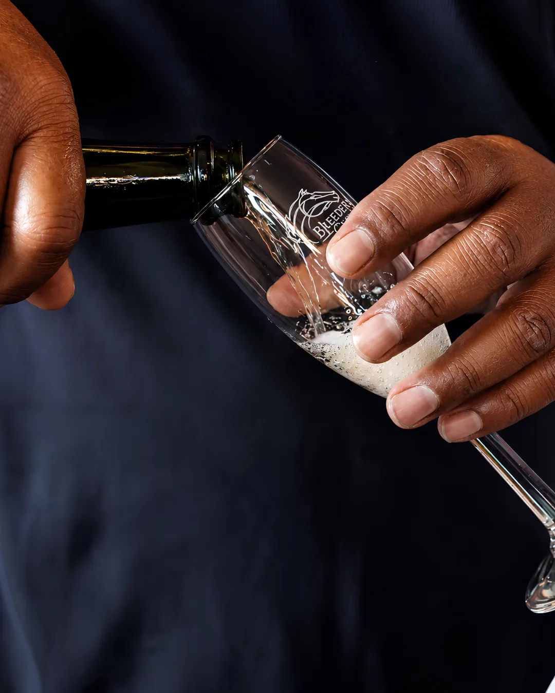 Champagne poured into a Bleeders' Cup flute after a Del Mar win