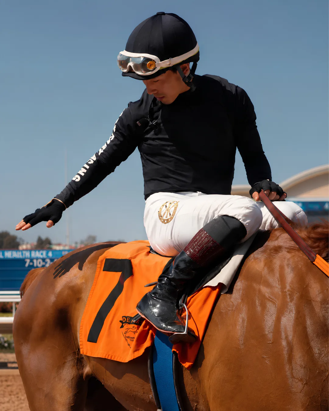 Jockey Kazushi Kimura aboard Che after winning race four at Del Mar