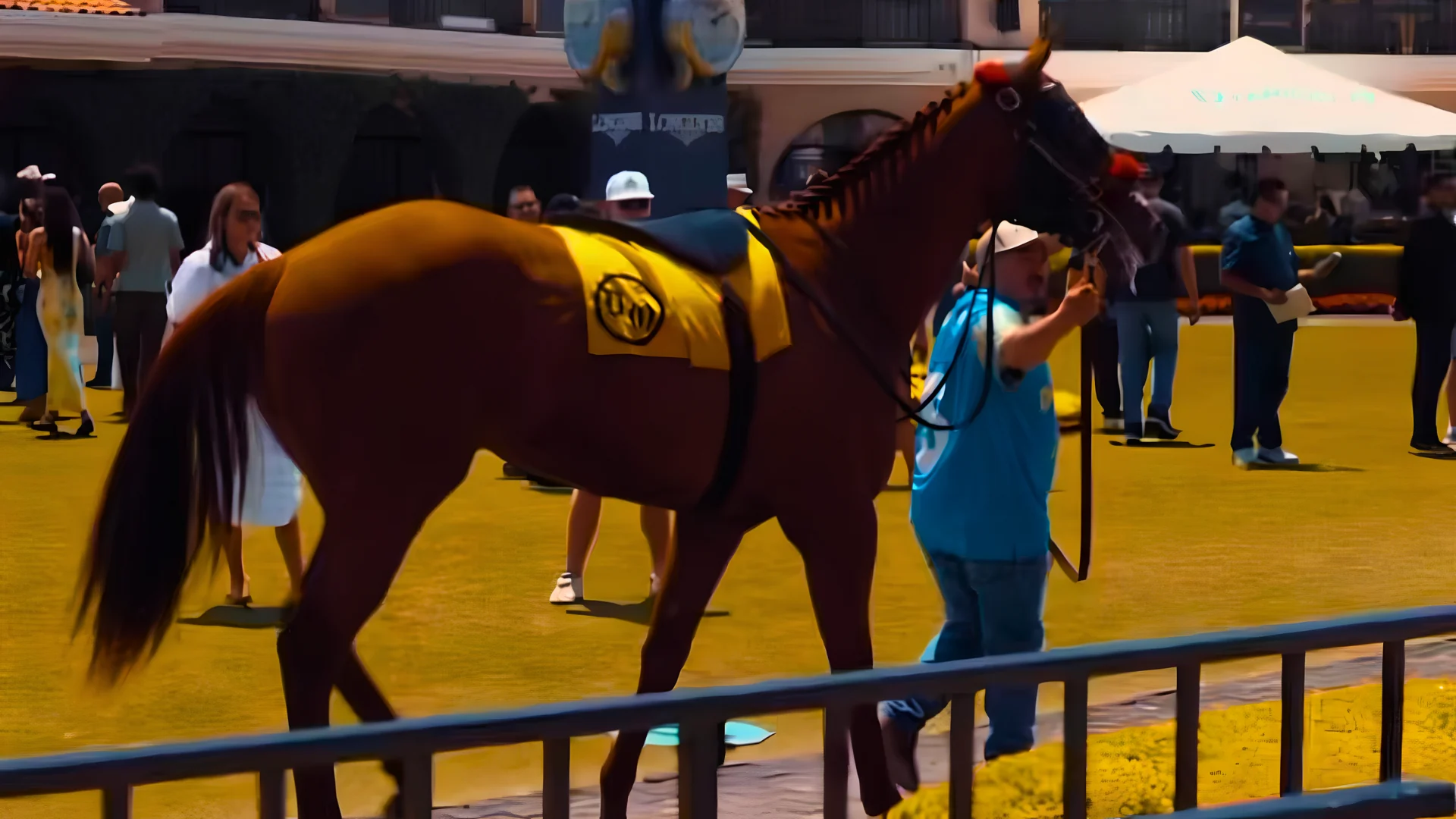 A runner walking the Del Mar paddock beneath the Longines clock before post time