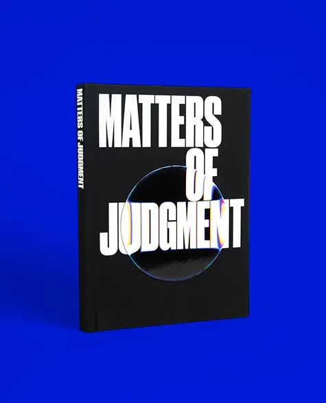 Black book titled "Matters of Judgment" in bold white text over a dark circle with a blue gradient. Set against a vibrant blue background.