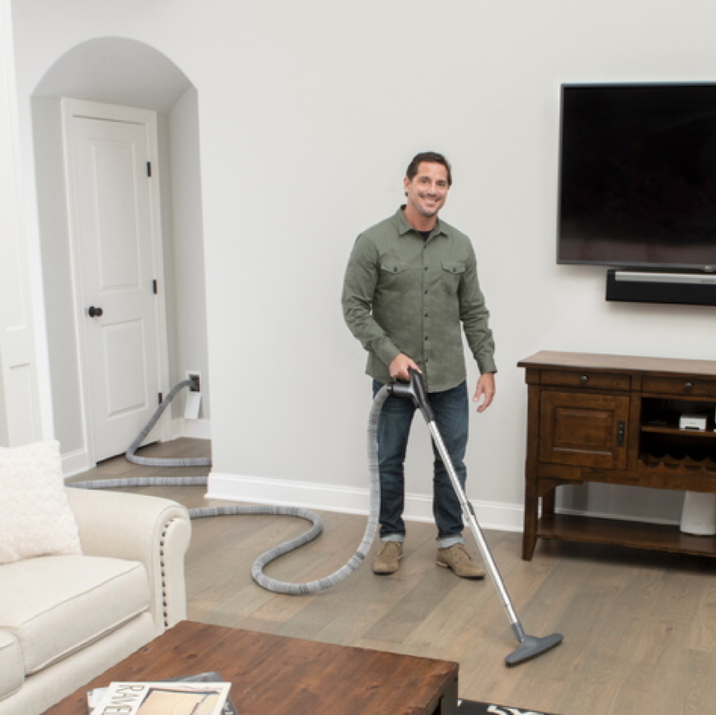 50-foot retractable hose cleaning a bare floor