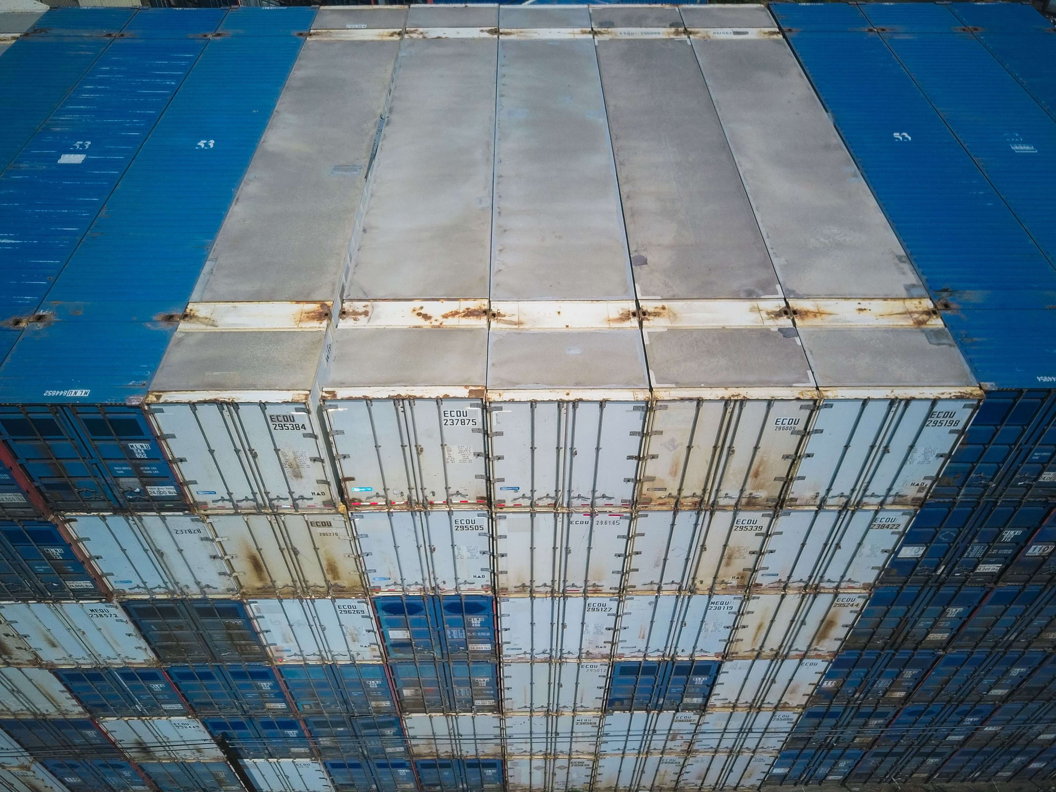Close-up of corrugated metal shipping container wall used for pharmaceutical and healthcare cargo transport
