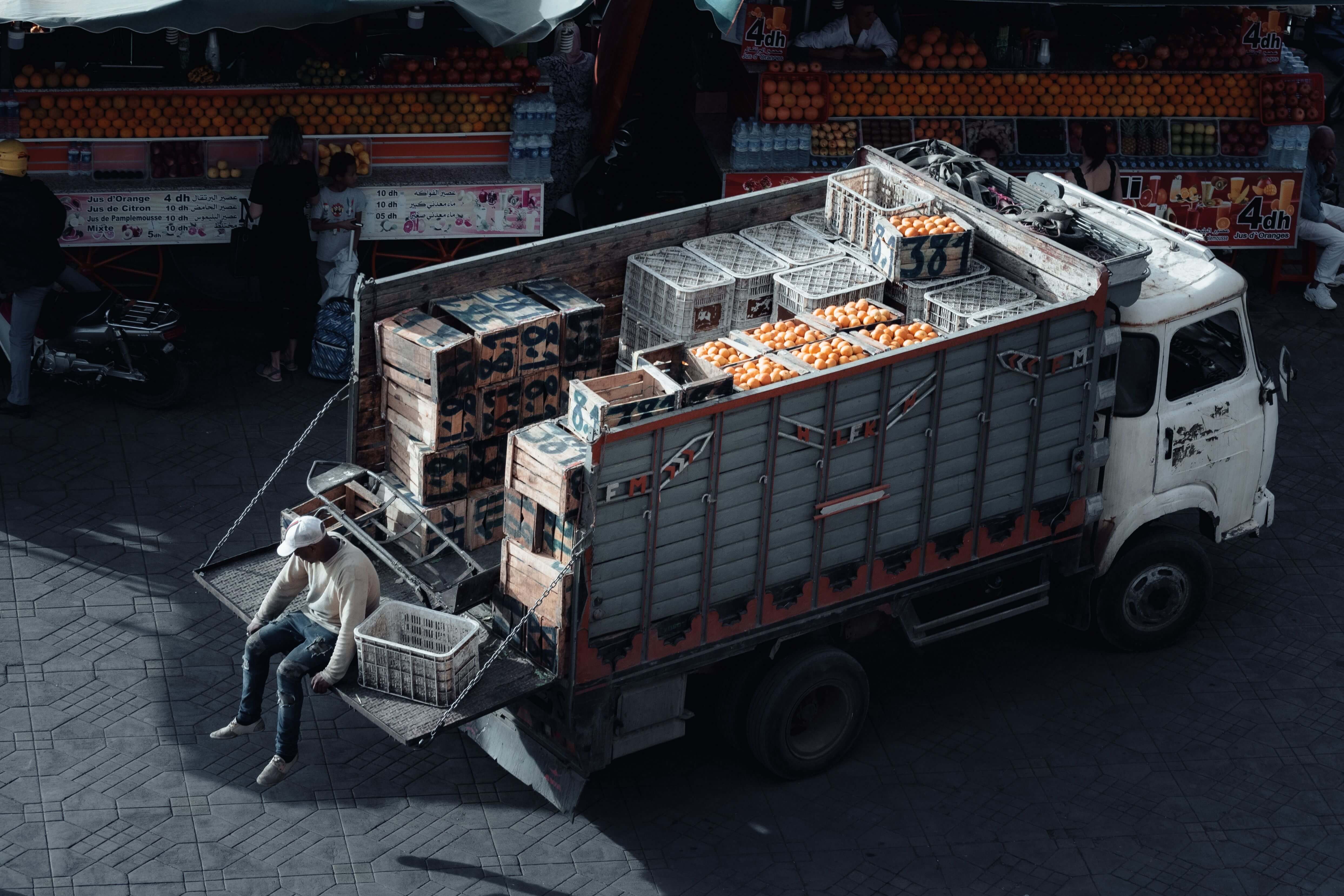 A food truck parked on a street serving as a mobile food and beverage distribution point