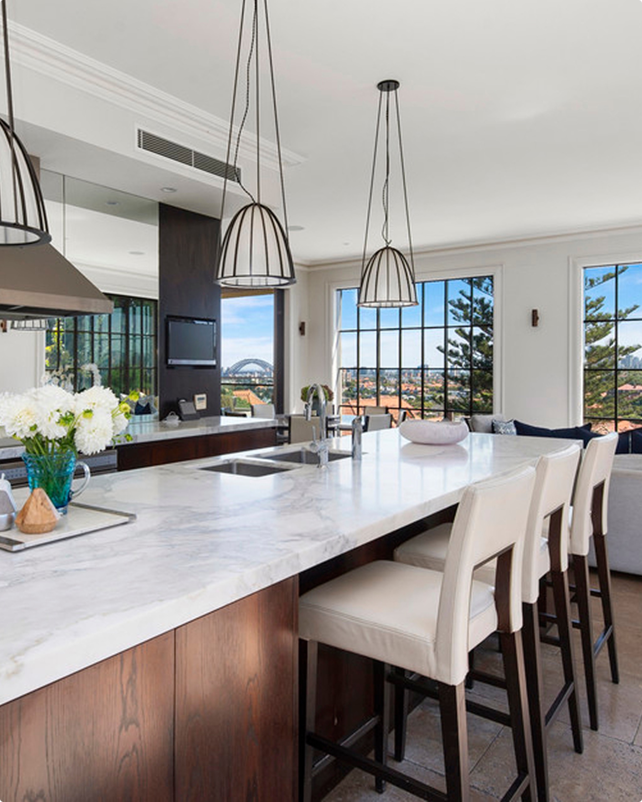 Marble kitchen with harbour outlook at 13 Ruby St, Mosman by Sydneyside Contracting