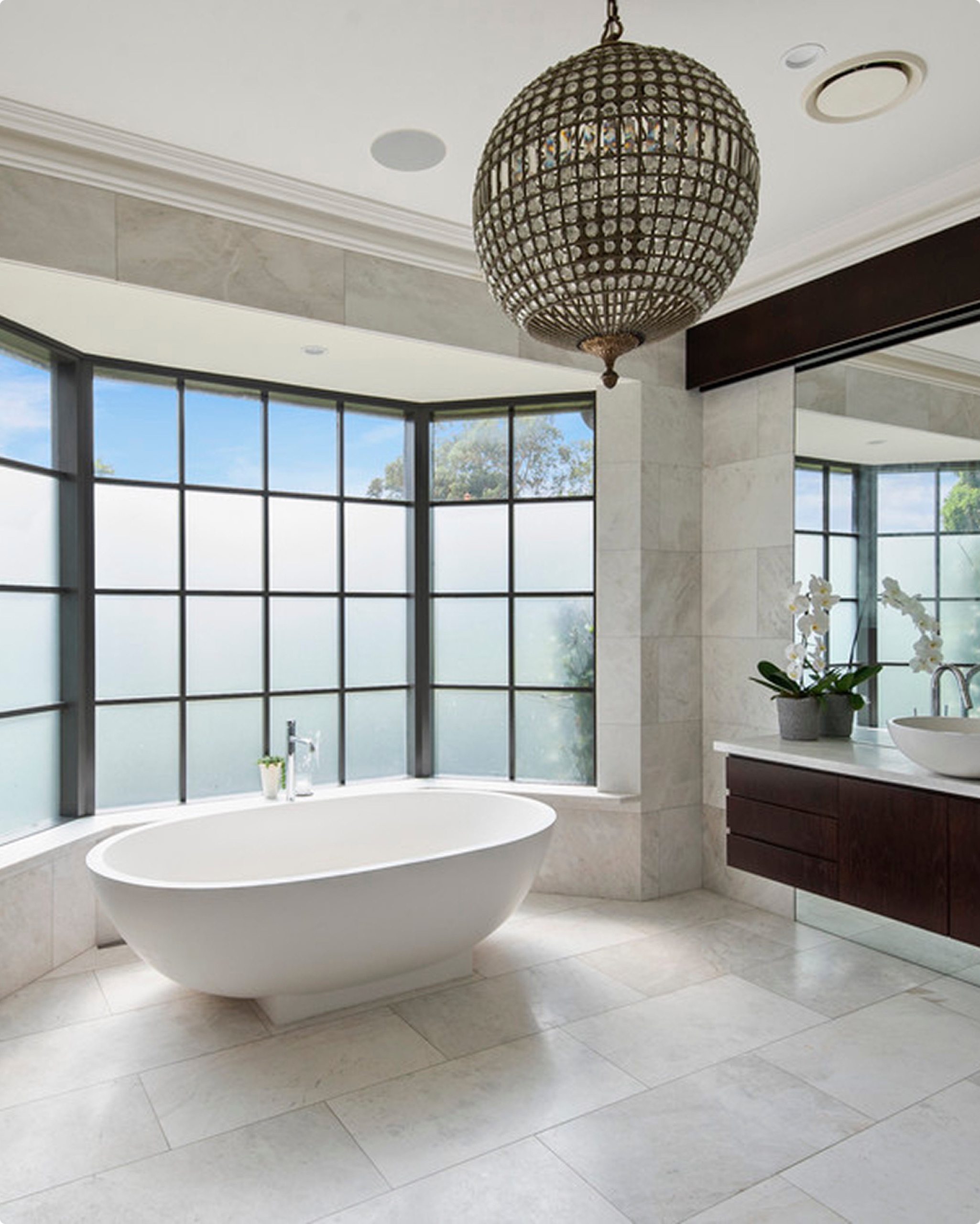 Stone ensuite with freestanding bath at 13 Ruby St, Mosman by Sydneyside Contracting