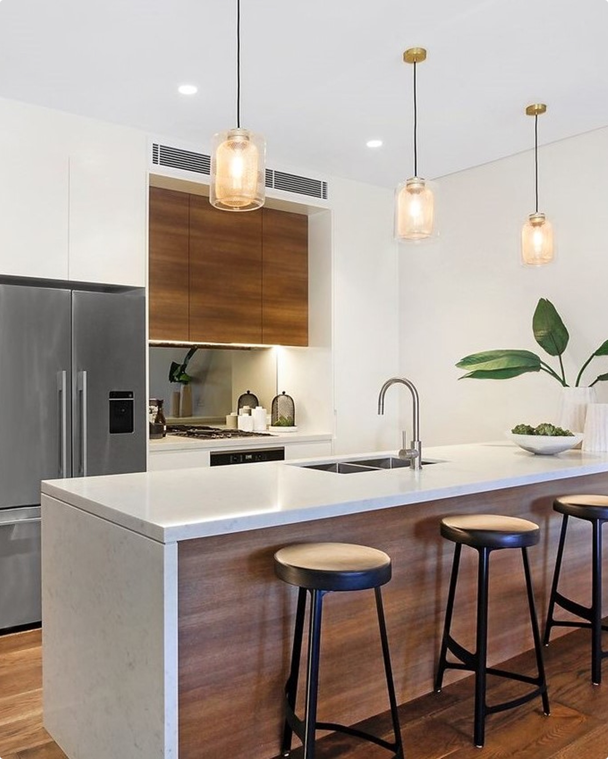 Master bedroom with balcony at Bourke St, Surry Hills by Sydneyside Contracting
