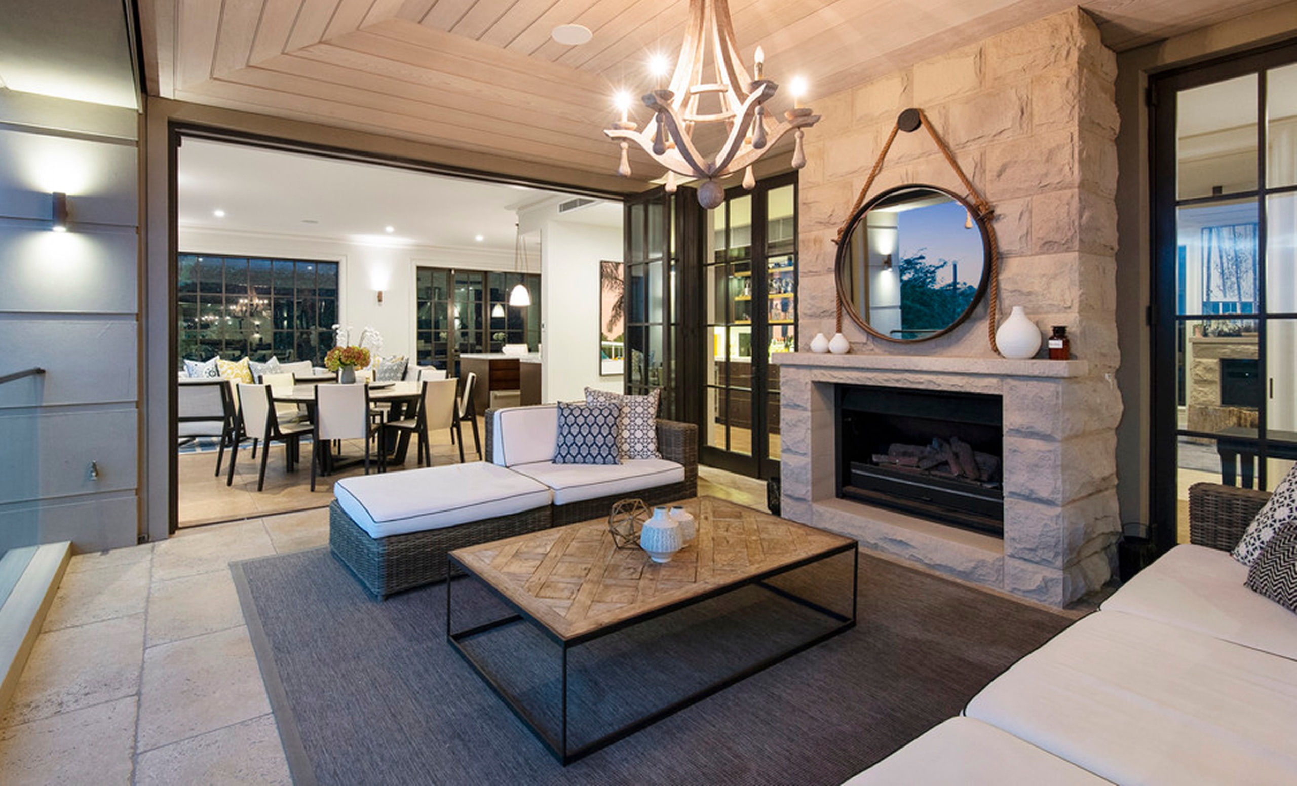 Covered outdoor lounge with fireplace at 13 Ruby St, Mosman by Sydneyside Contracting