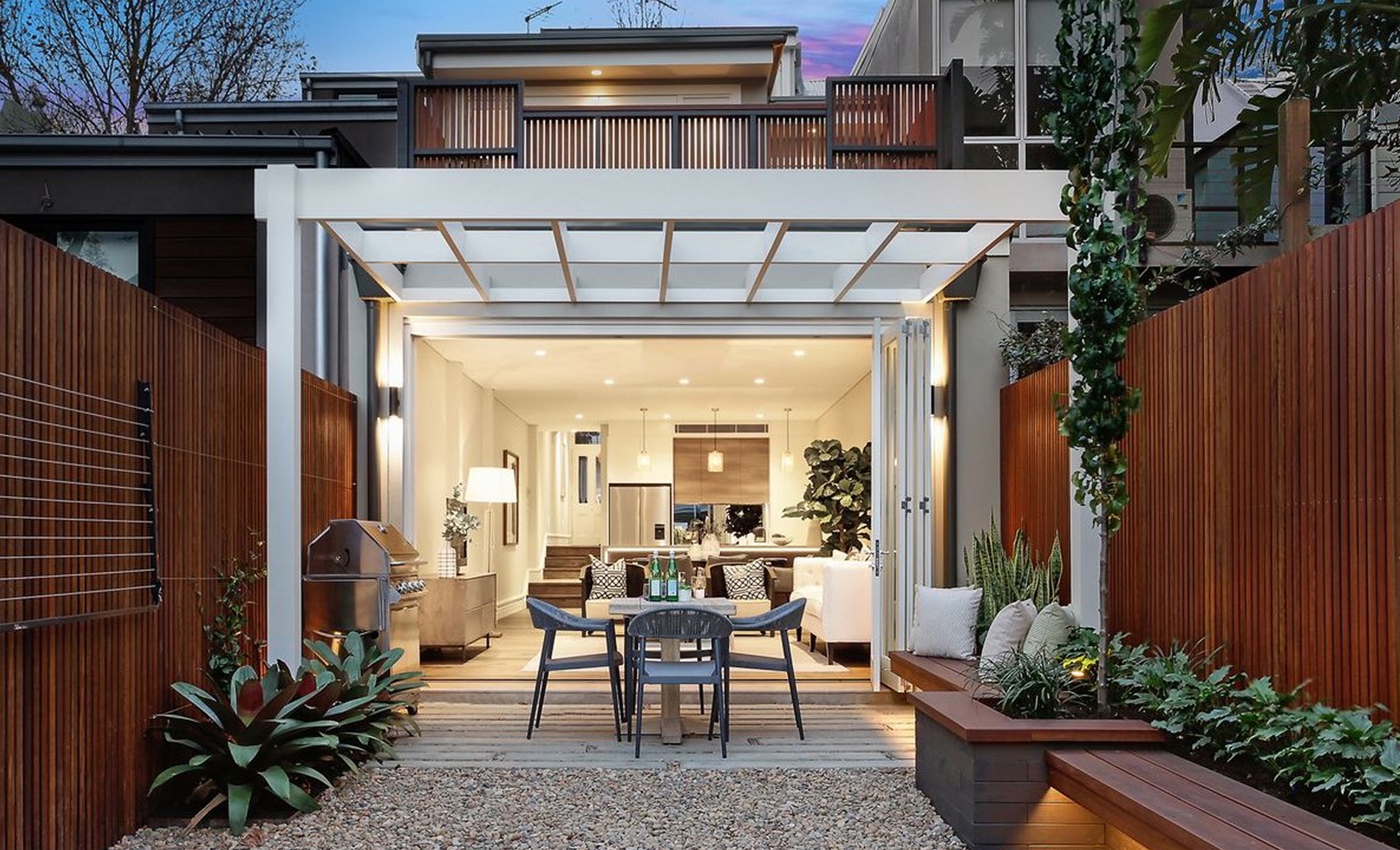 Rear courtyard with pergola at Bourke St, Surry Hills by Sydneyside Contracting