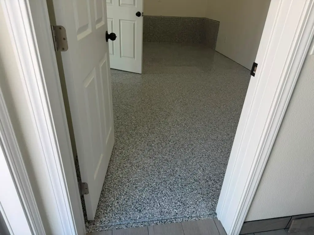 Gravel flake floor and flake-coated stem walls in the back room of the Yucaipa garage