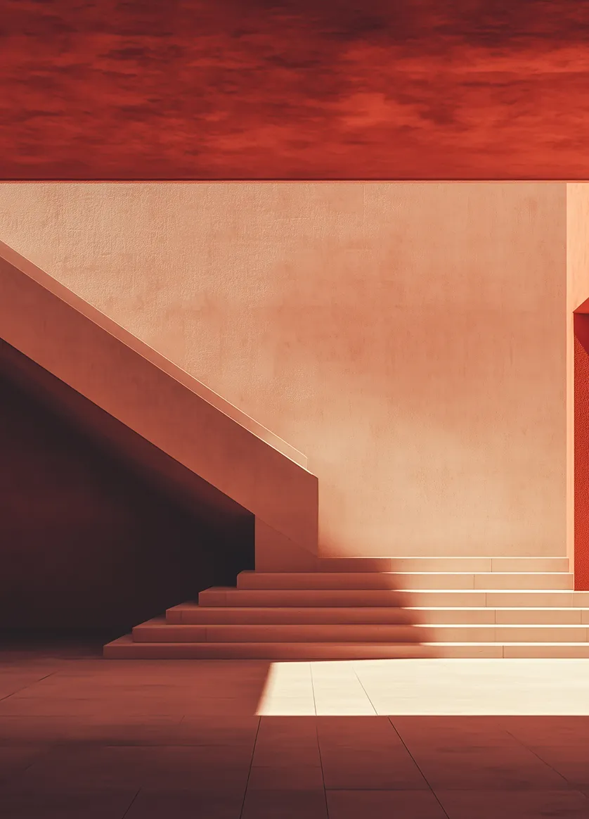 Modern stairs and ramp casting shadows against a beige wall under a dramatic red sky.