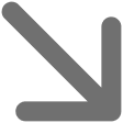 Gray arrow pointing diagonally down and right on a white background.