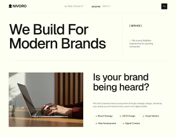 Website header with text 'We Build For Modern Brands' and a person working on a laptop.
