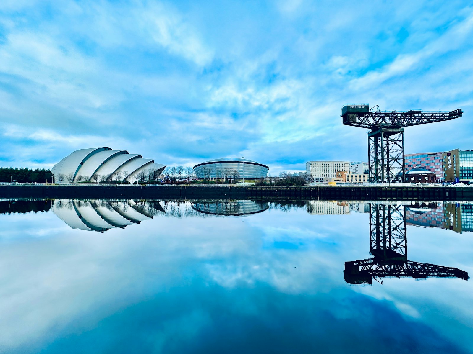 OVO Hydro, SEC Armadillo and Finnieston Crane reflected in the River Clyde, Glasgow