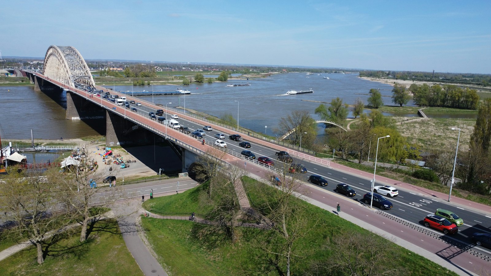 Aerial view of the Waalbrug over the Waal in Nijmegen, Nijmegen nightlife by neighbourhood
