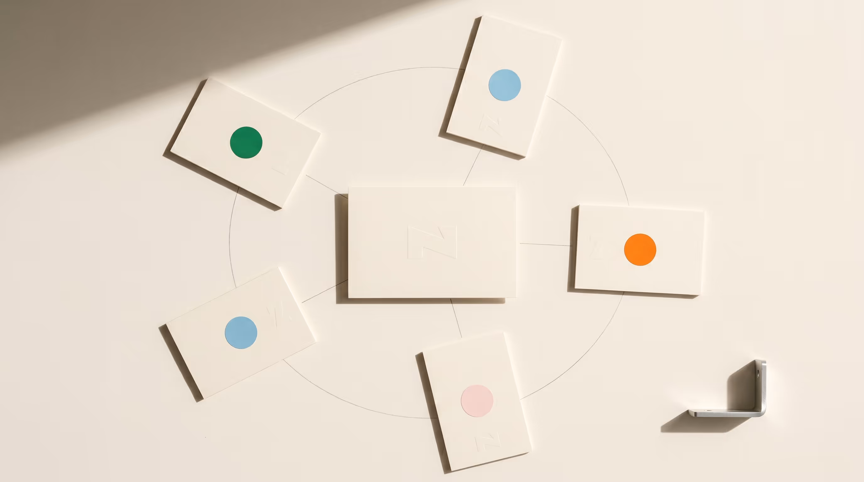 Editorial still life — AI cross-sell recommendation engine showing an anchor product card surrounded by a halo of related product recommendations.