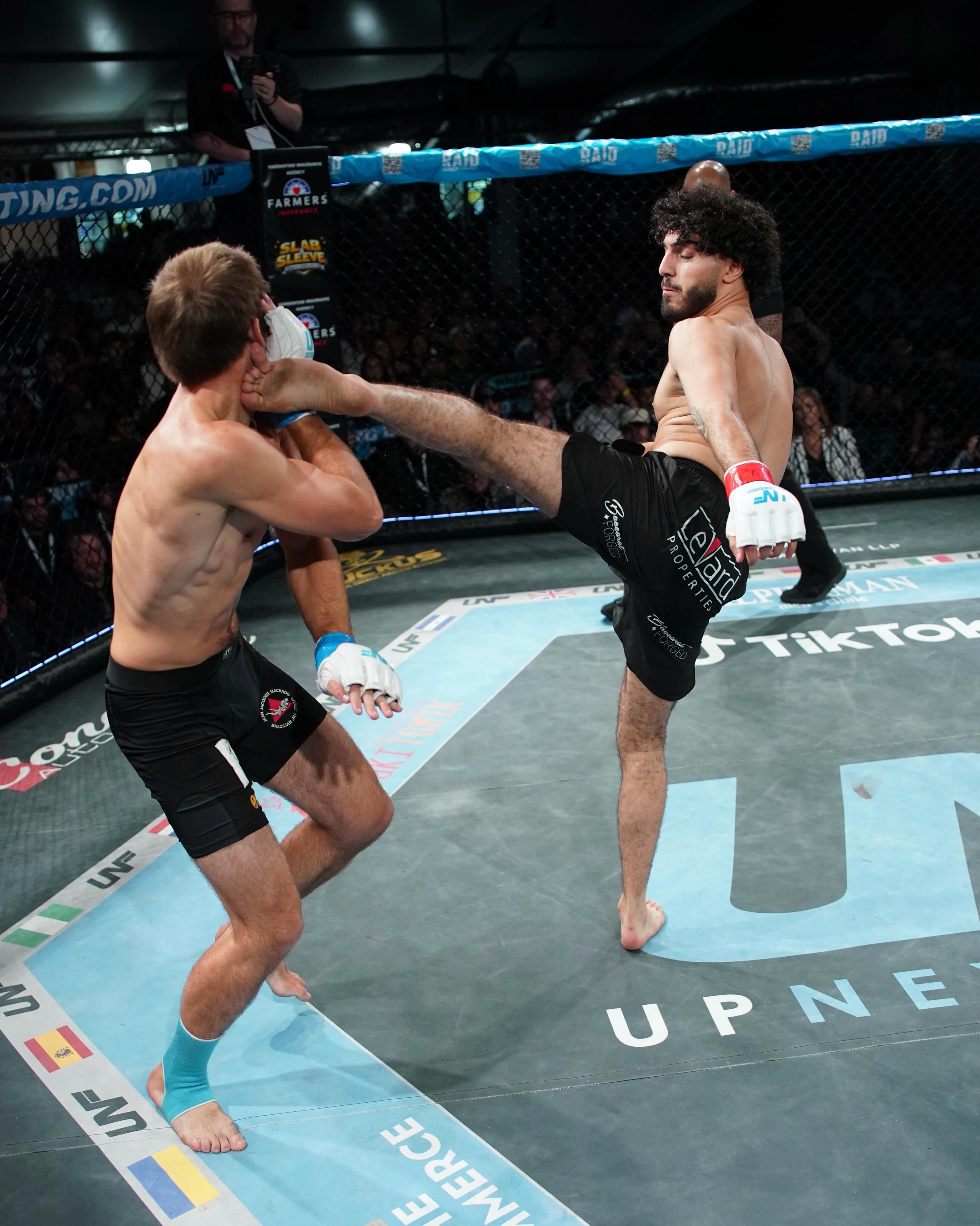 Anthony Vardumian lands a head kick in the UNF cage