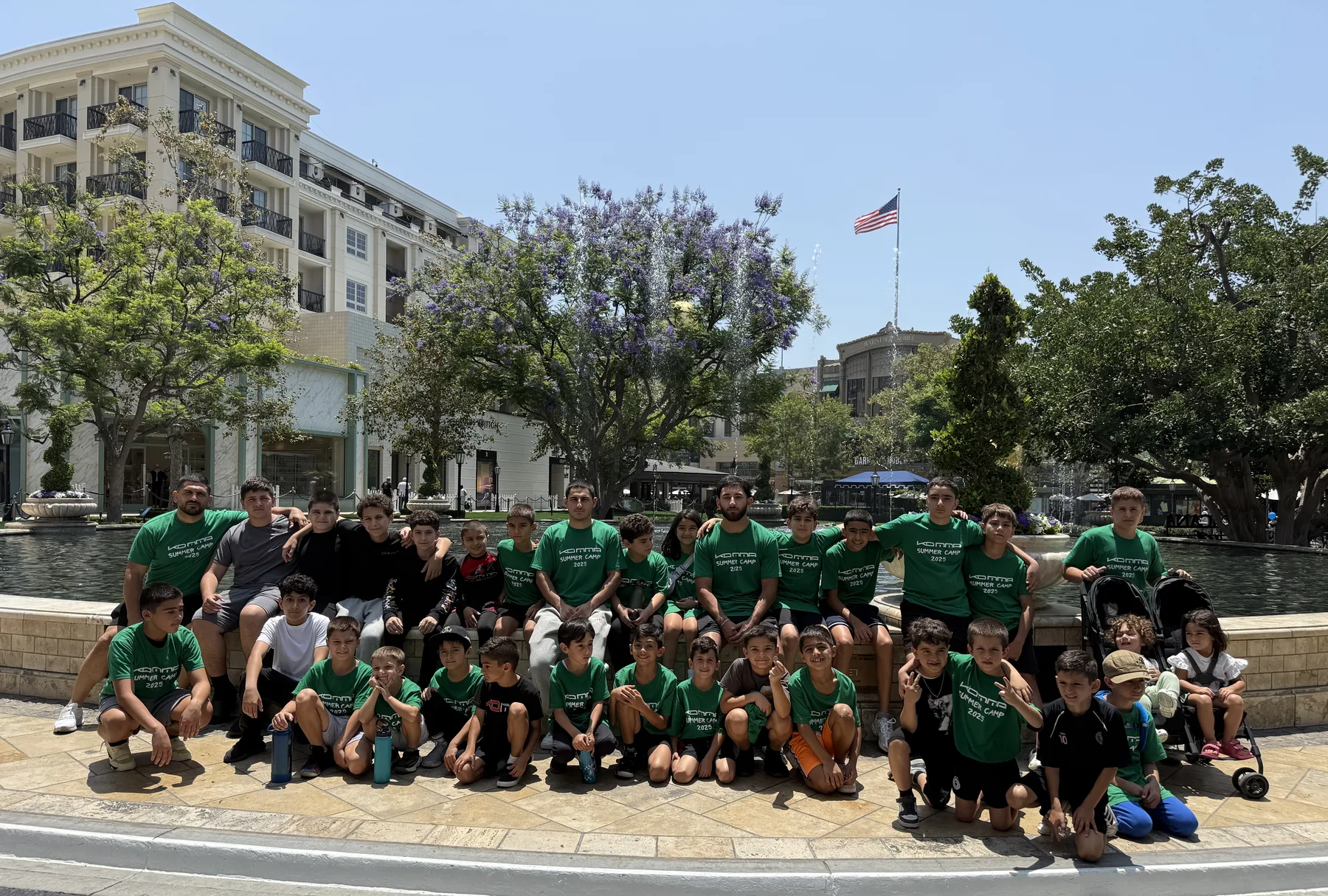 KD MMA youth team and coaches at a community event in Glendale
