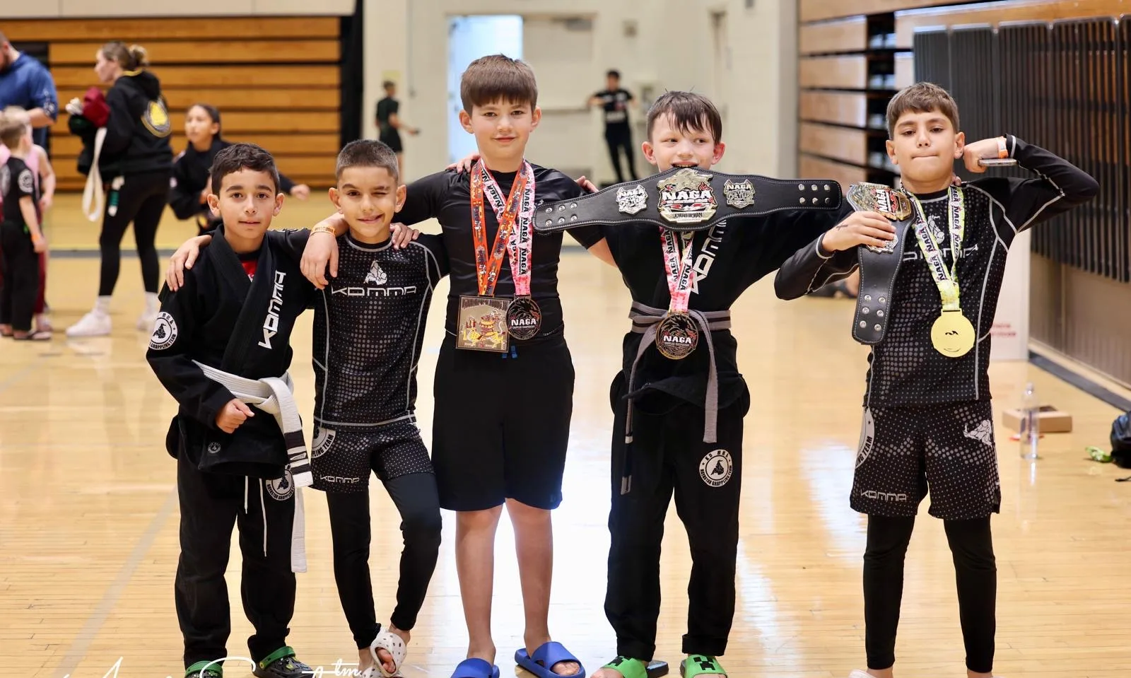 KD MMA kids team with their medals after a grappling competition