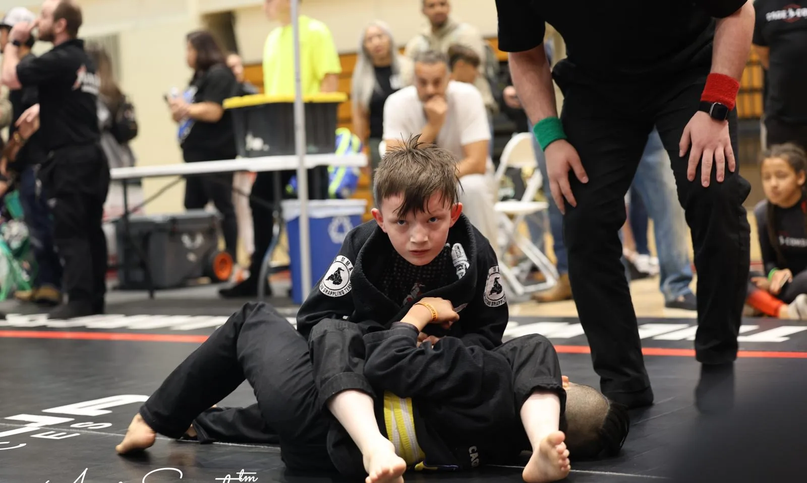 Young KD MMA athletes competing in a jiu-jitsu match