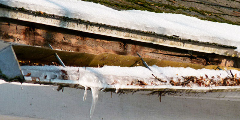 snow clogged gutters