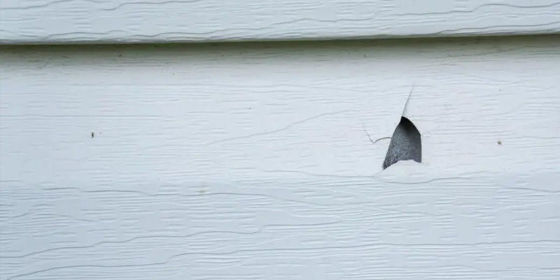 Crack on vinyl siding