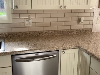 Backsplash tiling in kitchen.